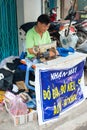 Vietnamese tailor at work Royalty Free Stock Photo