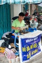Vietnamese tailor works at sewing machine Royalty Free Stock Photo