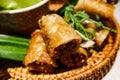Vietnamese or Thai deep fried spring roll on a basket Royalty Free Stock Photo