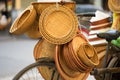 Vietnamese traditional bamboo baskets on vendor bike in Hanoi street Royalty Free Stock Photo