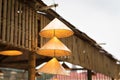 Vietnamese traditional conical hats hanging on wire for decoration. Royalty Free Stock Photo