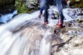 Vietnamese trekking sandal, hiking shoes on stream Royalty Free Stock Photo