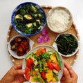 Vietnamese vegan cuisine, daily meal, seaweed, tofu soup, fried vegetables, dried bread cook with sauce, boiled water spinach Royalty Free Stock Photo