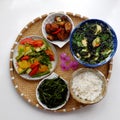 Vietnamese vegan cuisine, daily meal, seaweed, tofu soup, fried vegetables, dried bread cook with sauce, boiled water spinach Royalty Free Stock Photo