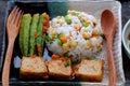 Vietnamese vegan food with fried rice and lotus seed, okra, tofu pie, simple vegetarian meal for non meat diet