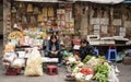 Vietnamese vendors sell vegetables, fruits and sundries on the streets of Hanoi. Vietnam