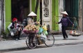 Vietnamese vendors selling fruit and street food Royalty Free Stock Photo
