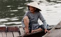 Vietnamese woman in boat Royalty Free Stock Photo