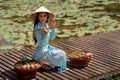 Vietnamese woman with lotus basket