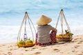 Vietnamese woman selling Fruits at Mui Ne beach. Vietnam