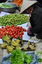 Vietnamese woman selling fruits and vegetables in Bac Ha market, Vietnam Royalty Free Stock Photo