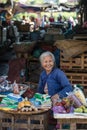 A Vietnamese woman selling goods at the market in Hoi An, Vietnam