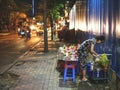 A Vietnamese woman selling products on street