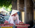 Vietnamese woman selling souvenirs in Hoi An Royalty Free Stock Photo