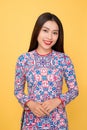 Vietnamese woman traditional festival costume Ao Dai. Tet holiday. Lunar New Year. Royalty Free Stock Photo