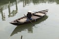 Vietnamese woman on wooden boat. Hoian Vietnam