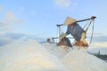 Vietnamese women are burdening hard to collect salt from the extract fields to the storage fields