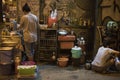 Vietnamese women sell beverages at night in an alley in Ho Chi Minh City, Vietnam