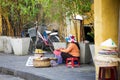 Vietnamese women selling food on the street of Hoi An Royalty Free Stock Photo