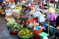 People selling fruits outdoor street market, Hoi, Vietnam Royalty Free Stock Photo