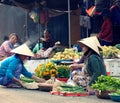 Vietnamese women selling vegetables at Hoi An market