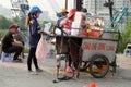 Vietnamese worker have breakfast at outside mobile restaurant