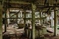 View of abandoned empty buildings of old tin mine. Industrial dirty building interior. Damaged factory in Rolava, Ore mountains, Royalty Free Stock Photo