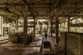 View of abandoned empty buildings of old tin mine. Industrial dirty building interior. Damaged factory in Rolava, Ore mountains, Royalty Free Stock Photo