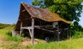 View of abandoned farmhouse in the landes countryside along Le Puy Route, France Royalty Free Stock Photo