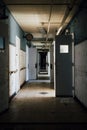 Abandoned Hallway with Open Doors - Morris Memorial Hospital for Crippled Children - Milton, West Virginia Royalty Free Stock Photo