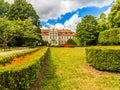 View on abbots palace and flowers in gdansk oliva park. Royalty Free Stock Photo