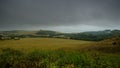 View from Abbotsbury Hill over St Catherine's Church in Abbotsbury with the Swannery and Fleet of Chesil Beach in the background, Royalty Free Stock Photo