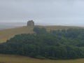 View from Abbotsbury Hill over St Catherine's Church in Abbotsbury with the Swannery and Fleet of Chesil Beach in the background, Royalty Free Stock Photo