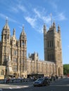 A view from Abingdon Street of the Victoria Tower of Westminster Palace on a sunny summer day in Central London, UK. Royalty Free Stock Photo