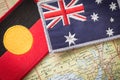 Aboryginal and Australian flag on the map of Australia Royalty Free Stock Photo