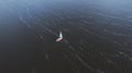 View from above, aerial view of sailing white modern not big sail boat or yacht with sail Royalty Free Stock Photo