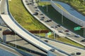 View from above of american big freeway intersection in Miami, Florida with slow driving cars during rush hour. USA