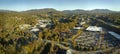 View from above of american grocery store with many parked cars on parking lot with lines and markings for parking Royalty Free Stock Photo