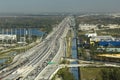 View from above of american wide freeway in Miami, Florida with dense traffic of driving cars during rush hour. USA Royalty Free Stock Photo