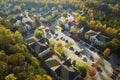 View from above of apartment residential condos between yellow fall trees in suburban area in South Carolina. American Royalty Free Stock Photo