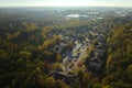 View from above of apartment residential condos between yellow fall trees in suburban area in South Carolina. American Royalty Free Stock Photo