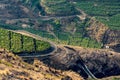 View from above on banana plantations and winding roads on La palma, Canary islands Royalty Free Stock Photo