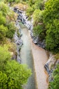 Basalt rocks and pristine water of Alcantara gorges in Sicily, Italy