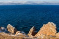 View above big beautiful lake and mountain Three brothers in winter, Baikal lake, Russia Royalty Free Stock Photo