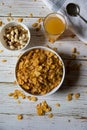 View from above of a bowl of corn flakes along with food ingredients