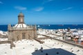 Town with part of the Santa Ana Cathedral, sea and freighter in Las Palmas on Gran Canaria, Spain Royalty Free Stock Photo