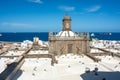 Town with part of the Santa Ana Cathedral, sea and freighter in Las Palmas on Gran Canaria, Spain Royalty Free Stock Photo