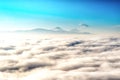 above the clouds with in the distance the popocatepetl volcano, Mexico Royalty Free Stock Photo