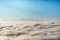 above the clouds with in the distance the popocatepetl volcano, Mexico Royalty Free Stock Photo