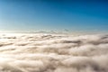 Above the clouds with in the distance the popocatepetl volcano, Mexico Royalty Free Stock Photo